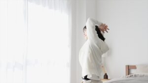 頭痛が軽くなりスッキリ目覚めた女性